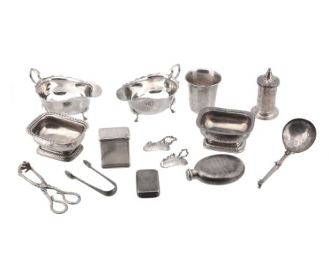  A collection of silver,   including: a pair of George III oblong footed salts, marks worn, London 1815?, monogrammed; a pair