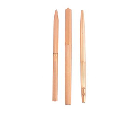  S. T. Dupont, a gold plated fountain pen and ball point pen set,   with knurled decoration, the fountain pen nib stamped 18K