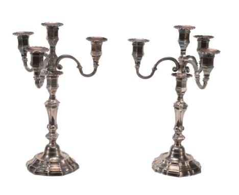  A pair of electroplated hexalobed three branch four light candelabra,   mid 20th century, 36cm (15 1/4in) high 