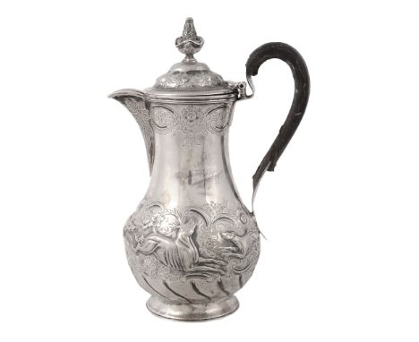  A Victorian Irish silver baluster hotwater pot by West  &  Son,   Dublin 1899, with a scroll decorated finial to the ogee do