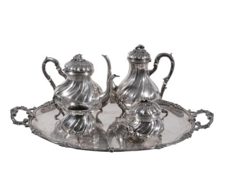  An Italian silver coloured wrythen baluster four piece tea service on a tray by Luigi Colombo,   Milan, 1934-44 .800 standar