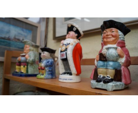 Four various Toby jugs, to include a Beswick Worthington Ale example; and a Copeland Spode example. 