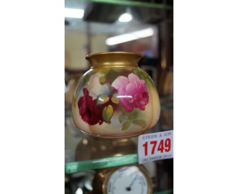 A Royal Worcester globular vase, circa 1922, painted with roses, 8cm high.
