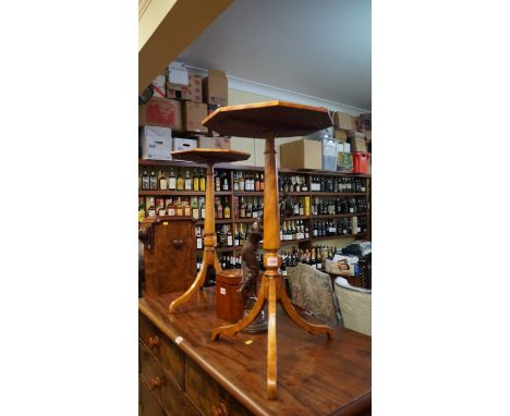 A pair of satin birch octagonal tripod tables, 37.5cm wide. 