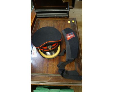 A British Army officers peak cap, associated cap badge; together with two further Scottish regimental caps. 