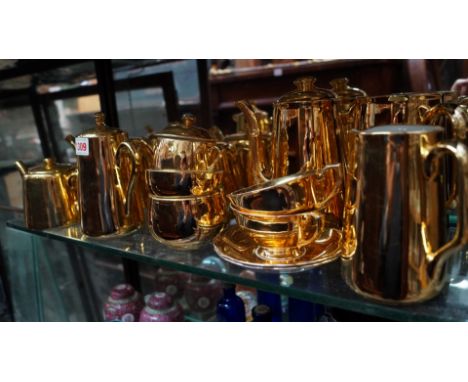 A Royal Worcester gilt part teaset.