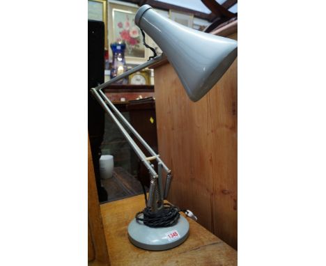 A Herbert Terry anglepoise lamp.