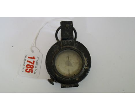 A World War II military gimbal compass, with broad arrow.
