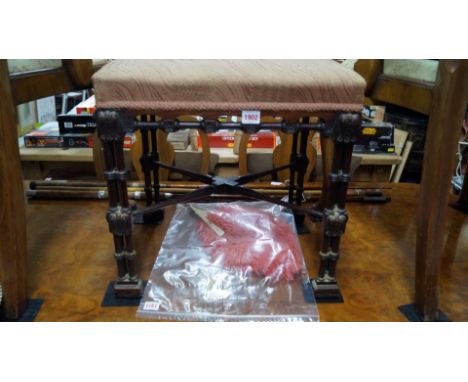 An interesting late Victorian carved mahogany and upholstered stool, with cluster column legs. Condition Report: Looks to be 