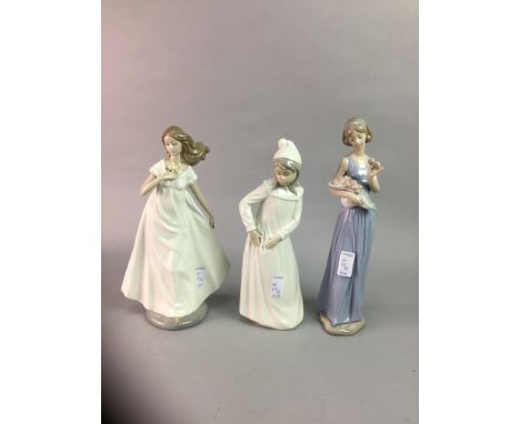 A LLADRO ANGEL with seven Nao figures (8)