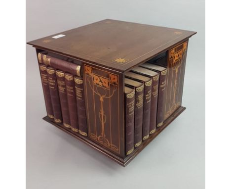 GLASGOW STYLE REVOLVING TABLE TOP BOOK SHELF, with inlaid Art Nouveau design