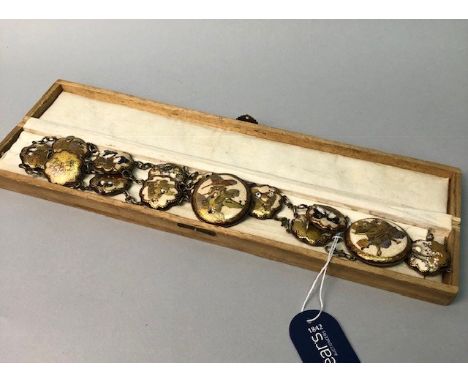 EARLY 20TH CENTURY JAPANESE SATSUMA BELT, composed of ceramic rondels painted with figures and landscapes scenes, bound in wh
