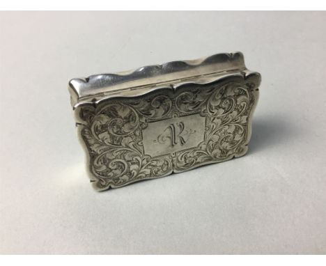 LATE VICTORIAN SILVER SNUFF BOX, maker Joseph Gloster, Birmingham 1896, the exterior bright cut with swirling decoration, ini