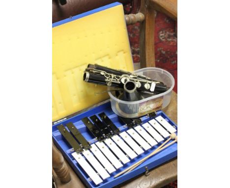 Cased AMII Xylophone together with a Clarinet
