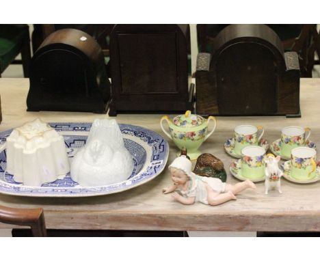 Group of Mixed Ceramics including Piano Baby, Beswick Otter Decanter, Beswick Wren, Jelly Mould, Egg Basket Lid, 19th century