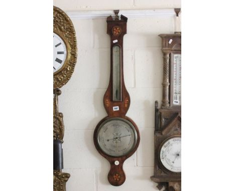 19th century Mahogany Wheel Barometer / Thermometer inlaid with flowers and shells, the silvered barometer face marked B Beso