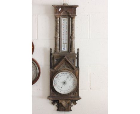 Early 20th century Carved Oak Cased Aneroid Barometer