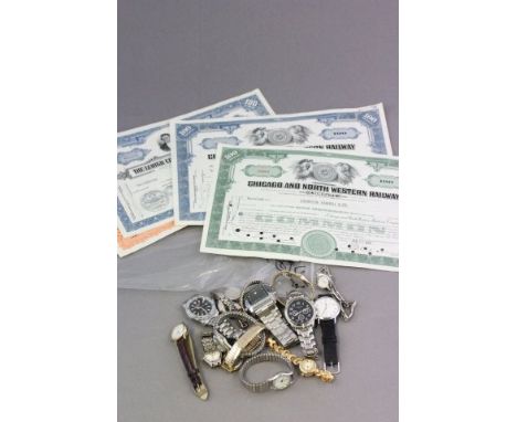 Quantity of Wristwatches plus Four  Coal and Navigation Share Certificates