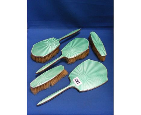 A silver and green guilloche enamel 3-piece dressing table set of mirror and four brushes, H/M Birmingham 1937.
