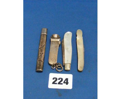 A silver cigar cutter, H/M Birmingham 1913 and a silver pipe cleaner, H/M 1905, plus two silver fruit knives with mother of p