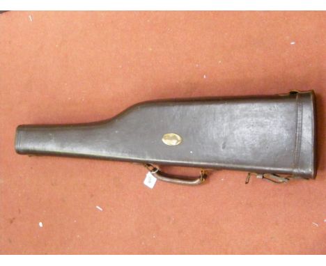 A vintage leather gun case.