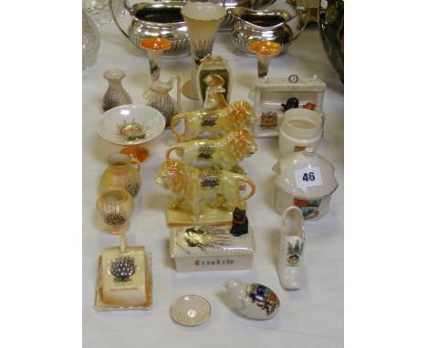 A collection of crested ware, to include various Lucky Heather examples including a trinket box with a black cat seated to th