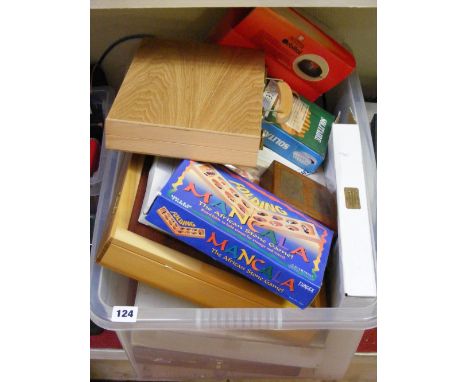 A box of vintage board games and gaming equipment including cribbage, solitaire and others.