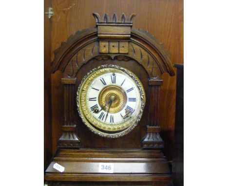 An Edwardian mahogany cased mantel clock with Continental movement.    