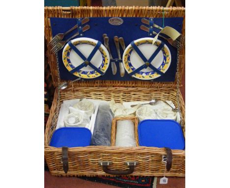 An Optima picnic set in wicker basket, make exclusively for House of Fraser, complete with original swing ticket.