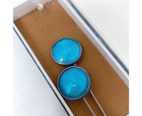 A pair of silver coloured metal and blue enamel hairpins, a similar brooch and a pendant 