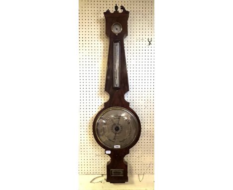 A wheel barometer, in a mahogany case, 110 cm high and a mahogany wine table, on a tripod base, 50 cm wide (2) 