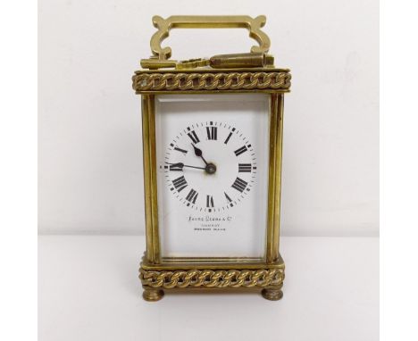 A carriage clock, retail by Favre Leuba & Co., in a brass case, 15 cm high 