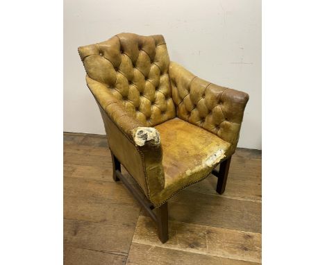 A brown leather button back armchair, in need of repair, and another (2) 