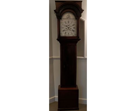 A longcase clock, the 30 cm arched square silvered dial, signed E D W Hunt, Williton, the chapter ring with Roman numerals, t