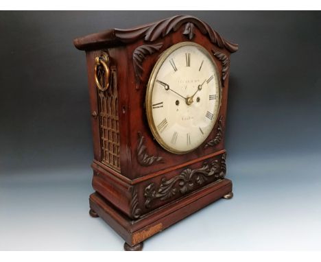 A bracket clock, the painted dial indistinctly signed, London, with a twin train double fusee movement, striking on a bell, i