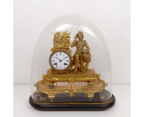 A gilt metal mantle clock, with enamel dial, in a gilt metal figural case, under a glass dome, 40 cm high 