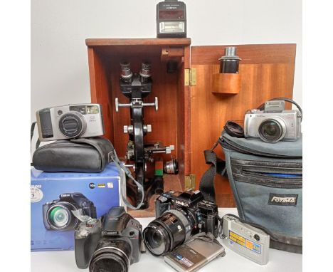 A Beck microscope, model 48, cased and assorted cameras (box) 