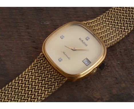 A circa 1980s Rado automatic gold plated wrist watch,  32mm case on intergrated mesh link bracelet, the guilt dial with three
