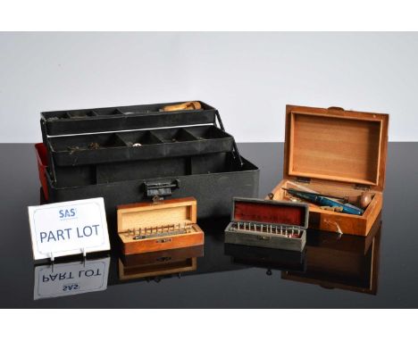 A good collection of watch makers and repairers tools and accessories, presented in four small plastic tool boxes and other b