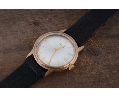 A 1970s Garrad manual wind 9ct gold cased presentation wristwatch, 34mm, silvered dial with guilt batons, engraved to reverse