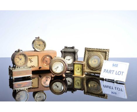 A collection of fourteen travel and other timepieces, four by Waterbury Clock Co, and several others in varying conditions