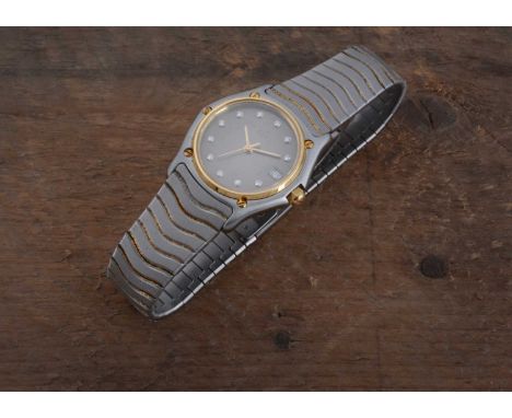 A modern Ebel quartz stainless steel and gold plated ladies wrist watch,  27mm wide with grey dial and date appirture and hav