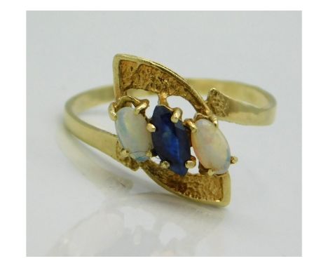 A 14ct gold ring set with sapphire &amp; opal, crack to shank, 1.7g, size P 