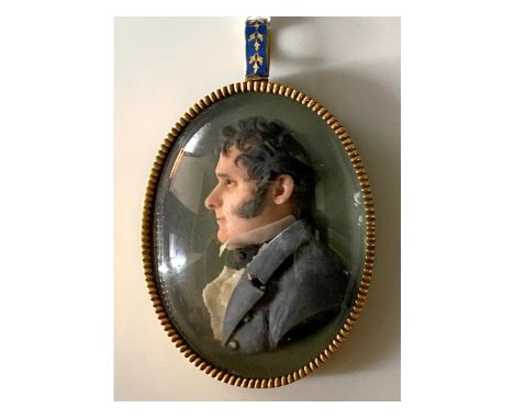 An Italian school, early 19thC. coloured wax miniature portrait plaque from same family as lot 212, wearing black coat &amp; 