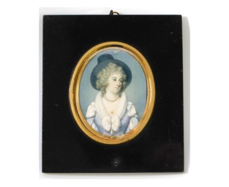 In the style of Richard Crosse (1742-1810), a miniature portrait of Mrs. Wells, actress, in character set in papier-mache fra