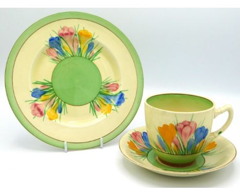 A Royal Staffordshire by Clarice Cliff crocus pattern trio with gilded mark