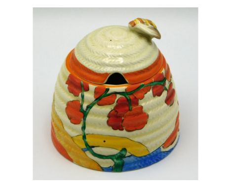 A Clarice Cliff Bizzare honey pot, 3.5in tall