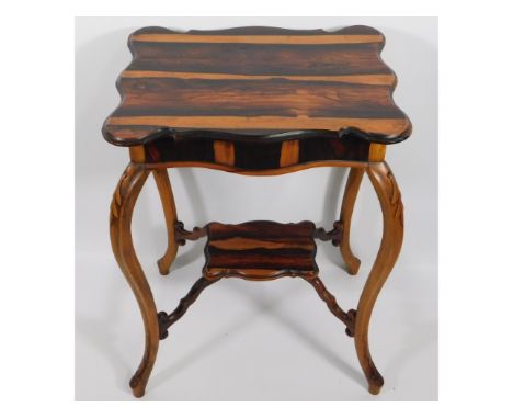 A two tier coromandel wood lamp table, 28.5in high x 20in wide x 16in deep 