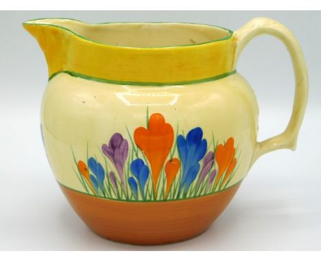 A Clarice Cliff Bizarre crocus design jug, 7.875in wide x 5.75in high, hairline to rim near handle