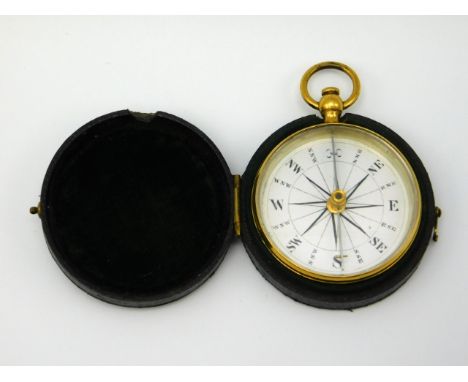 A pocket sized brass compass, face diameter 42mm